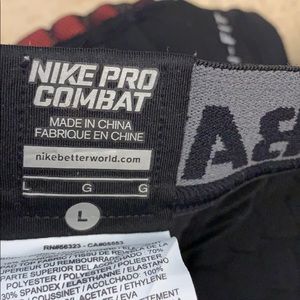 Nike men’s lg, pro combat dri fit Football pads,